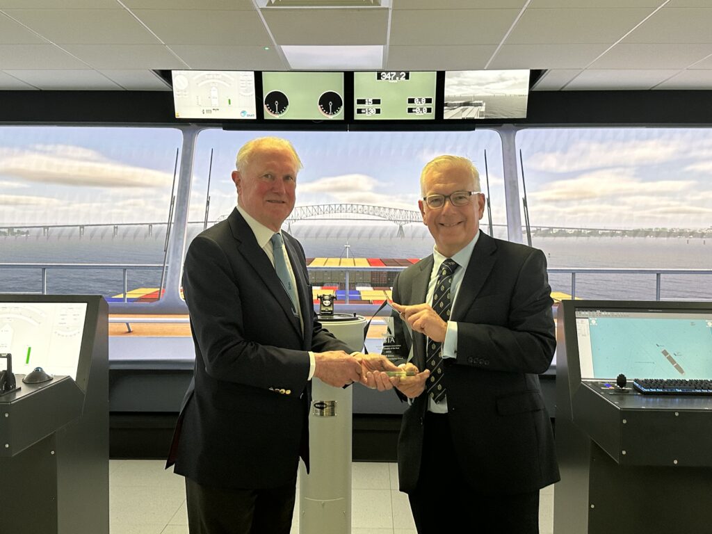 Tom Woolley presents Bill Evans with award