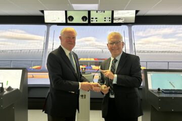 Tom Woolley presents Bill Evans with award